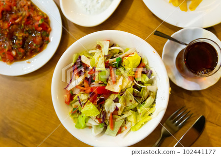 Lettuce, tomatoes Turkish starter in restaurant Lettuce, tomatoes Turkish starter in restaurant 102441177
