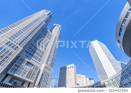 Shinjuku Ward, Tokyo Cityscape of the Tokyo Metropolitan Government Building and the Nishi-Shinjuku Buildings on a sunny day 102442564