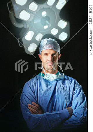 He takes your health seriously. Cropped portrait of a male doctor against a dark background. 102446103