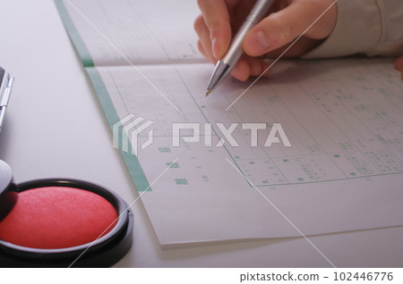 woman writing divorce papers woman writing divorce papers 102446776