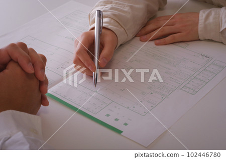 woman writing divorce papers woman writing divorce papers 102446780