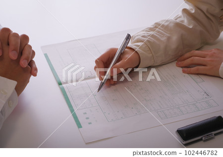 woman writing divorce papers 102446782