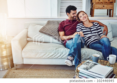 This is how I wanna spend all my free time. High angle shot of an affectionate young couple relaxing on the sofa at home. This is how I wanna spend all my free time. High angle shot of an affectionate young couple relaxing on the sofa at home. 102446945