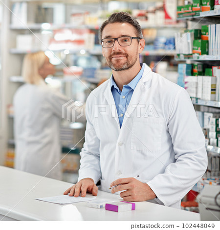 Drop in anytime to see me without an appoinymrmt. a pharmacist at work with his colleague in the background. All products have been altered to be void of copyright infringements. 102448049