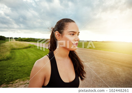 I run my day, it doesnt run me. a fit young woman getting some exercise outside on a beautiful day. 102448261
