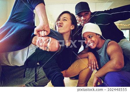We just wanna dance. Portrait of a group of young dancers in a dance studio. 102448555