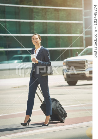On a business mission. a young businesswoman on the move in the city. On a business mission. a young businesswoman on the move in the city. 102449274