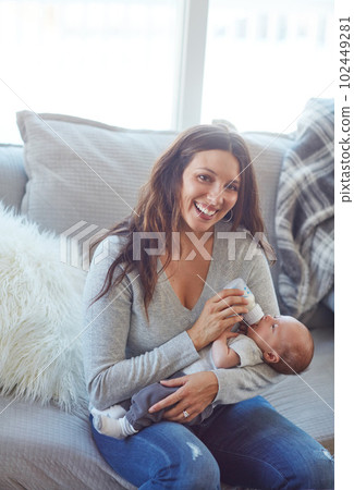 Hes too precious. Portrait of a mother feeding her newborn baby. Hes too precious. Portrait of a mother feeding her newborn baby. 102449281
