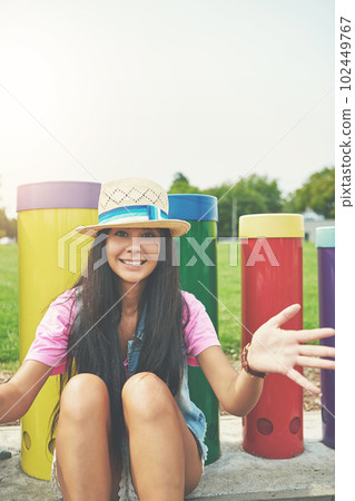 Its a great day to be outdoors. Cropped portrait of an attractive young woman spending a day in the park. Its a great day to be outdoors. Cropped portrait of an attractive young woman spending a day in the park. 102449767
