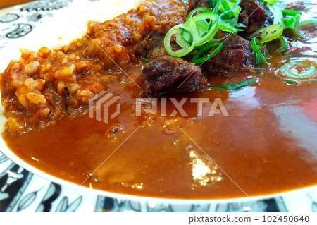 Curry and rice  102450640