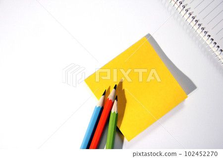 Pencil and notebook close-up stationery concept 102452270