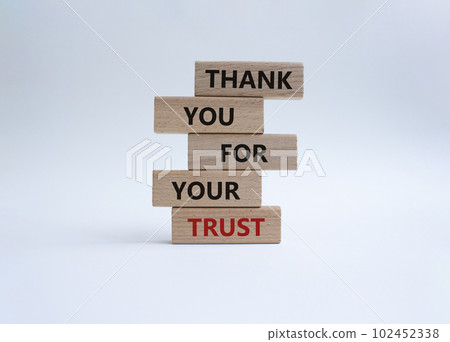Thank you for your trust symbol. Wooden blocks with words Thank you for your trust. Beautiful white background. Business and Thank you for your trust concept. Copy space 102452338