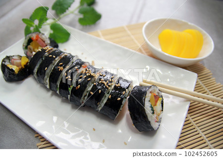 Korean roll Gimbap(kimbob) made from steamed white rice (bap) and various other ingredients Korean roll Gimbap(kimbob) made from steamed white rice (bap) and various other ingredients 102452605