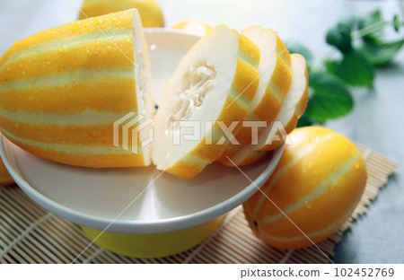 Sweet and crunchy Korean specialty Seongju melon summer fruit concept 102452769