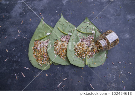 Decoration Green betel Leaf or pan on the concrete floor Decoration Green betel Leaf or pan on the concrete floor 102454618