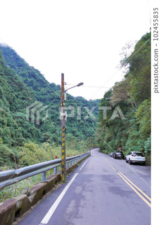 mountain road, telephone pole 102455835