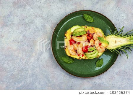 Fresh pineapple with shrimp, rice and avocado. Fresh pineapple with shrimp, rice and avocado. 102456274