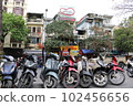 Motorbikes lined up in Hanoi, Vietnam 102456656