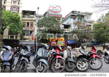 Motorbikes lined up in Hanoi, Vietnam 102456656