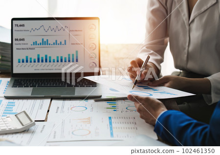 Fund managers team consultation and discuss about analysis Investment stock market. analysis, research finance 102461350