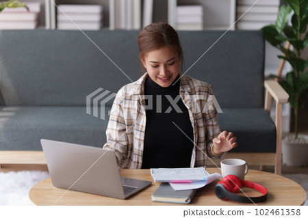 Accountant woman working on laptop and do document, tax, exchange, research, accounting and Financial advisor concept 102461358