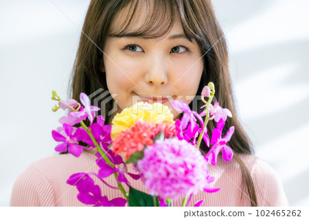A woman with a bouquet A woman with a bouquet 102465262