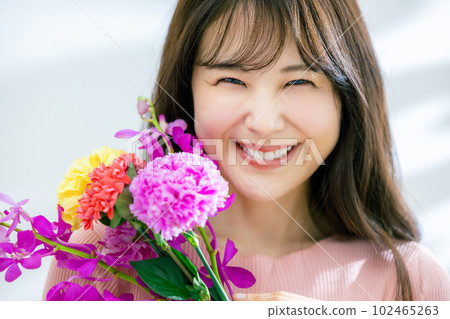 A woman with a bouquet A woman with a bouquet 102465263