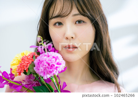 A woman with a bouquet A woman with a bouquet 102465266