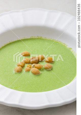 green peas soup with fried peas 102466436