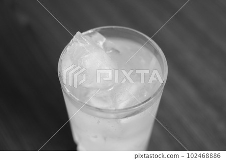 glass with ice and carbonated water glass with ice and carbonated water 102468886