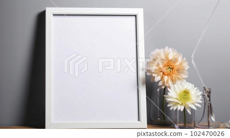 Mockup of picture frame decorated with spring flowers clean space for text on white background 102470026