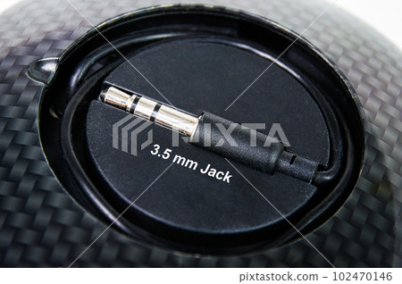 Close up of 3.5 mm male jack for audio stereo input of amplifier receiver. 102470146