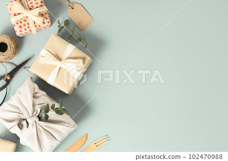 Zero waste, eco friendly hand made box packaging gifts on blue background 102470988