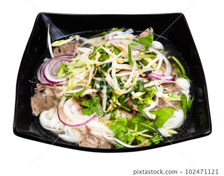 Vietnamese Soup Pho Bo in bowl cutout on white Vietnamese Soup Pho Bo in bowl cutout on white 102471121
