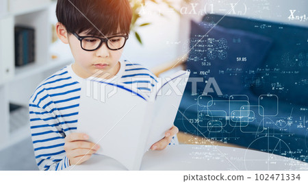 Science and technology image with a boy reading a book Science and technology image with a boy reading a book 102471334