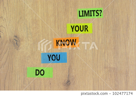 Do you know your limits symbol. Concept words Do you know your limits on colored paper. Beautiful wooden table wooden background. Business do you know your limits concept. Copy space. 102477174