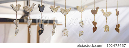 Ceramic handmade birds are attached on a rope. Designed to mount at the base of the door, make a sound when the door is opened Ceramic handmade birds are attached on a rope. Designed to mount at the base of the door, make a sound when the door is opened 102478667