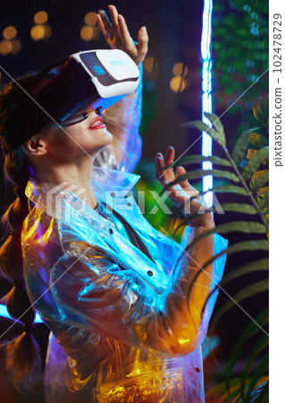 modern woman in virtual reality in vr goggles 102478729