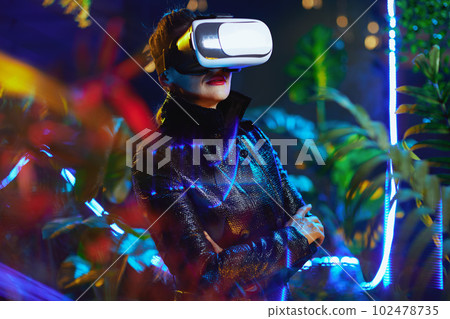 modern woman in virtual reality in vr goggles modern woman in virtual reality in vr goggles 102478735
