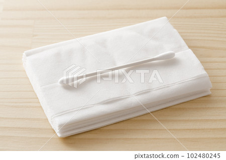 cotton swabs and tissue paper 102480245
