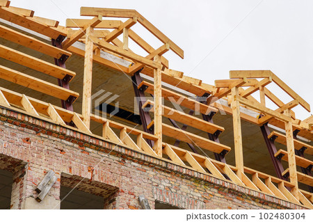 Reconstruction of the roof structures of a historical building using metal and wooden beams Reconstruction of the roof structures of a historical building using metal and wooden beams 102480304