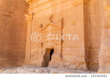 Carved ornamented entrance to the tomb at Jabal al banat complex, Hegra, Al Ula, Saudi Arabia 102483081