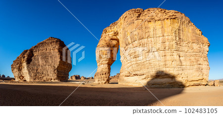 Sandstone elephant rock erosion monolith standing in the desert, Al Ula, Saudi Arabia Sandstone elephant rock erosion monolith standing in the desert, Al Ula, Saudi Arabia 102483105