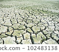 Dried and cracked land surface.climate change effect. 102483138