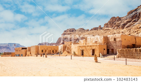 Al Ula old town street with traditional mud huts, Medina province, Saudi Arabia 102483143