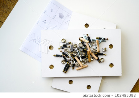 New white laminated chipboard furniture self mounting set with fitting kit and assembly diagram New white laminated chipboard furniture self mounting set with fitting kit and assembly diagram 102483398