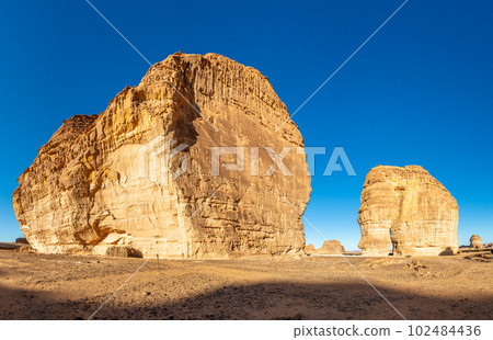 Sandstone elephant rock erosion monolith standing in the desert, Al Ula, Saudi Arabia 102484436