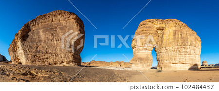 Sandstone elephant rock erosion monolith standing in the desert, Al Ula, Saudi Arabia 102484437