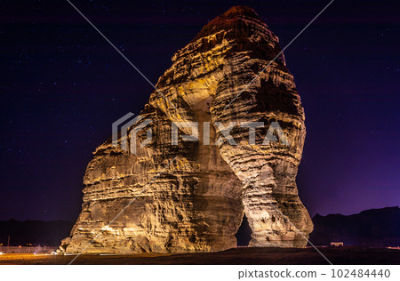 Sandstone elephant rock erosion monolith standing in the desert, Al Ula, Saudi Arabia Sandstone elephant rock erosion monolith standing in the desert, Al Ula, Saudi Arabia 102484440