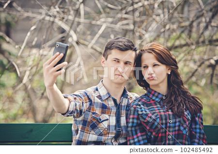 Young couple doing selfie 102485492